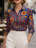 Camicia blu con stampa floreale e maniche lunghe