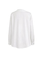 Camicia bianca asimmetrica con bottoni e maniche lunghe