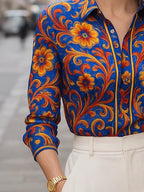 Camicia blu con stampa floreale e maniche lunghe