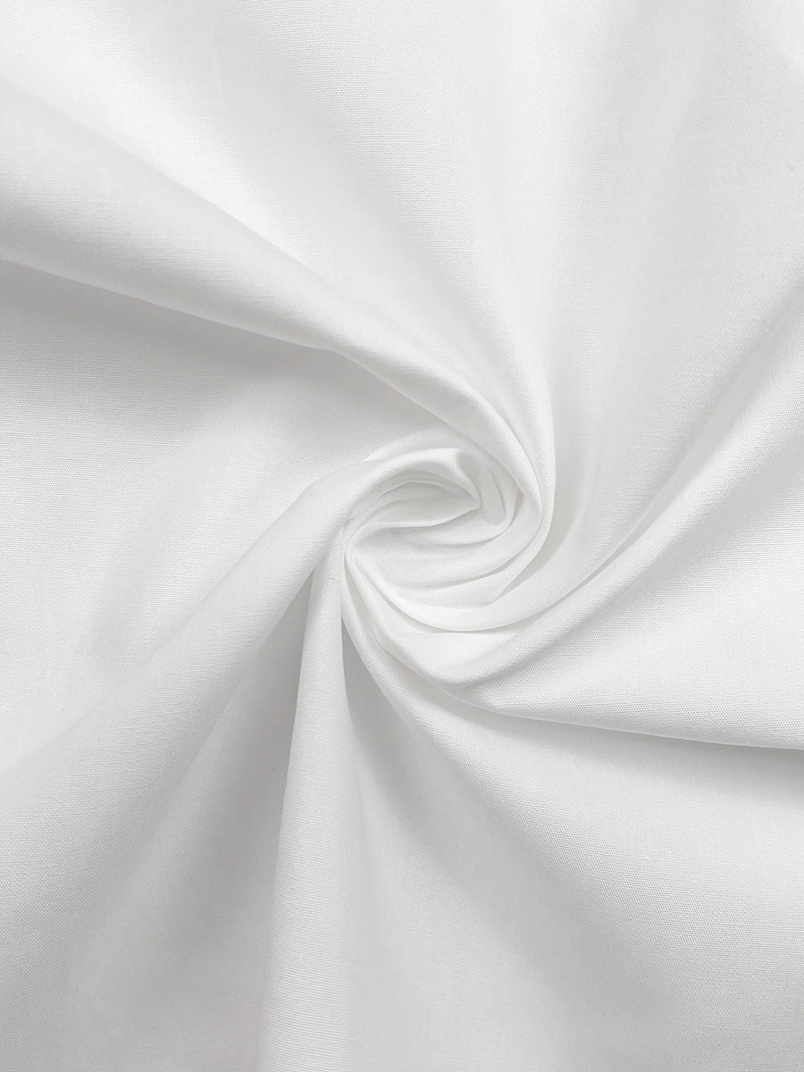 Camicia bianca asimmetrica con bottoni e maniche lunghe