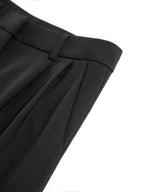 Pantaloni bianchi a gamba larga con pieghe frontali
