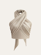 Top halter beige senza maniche con incrocio frontale