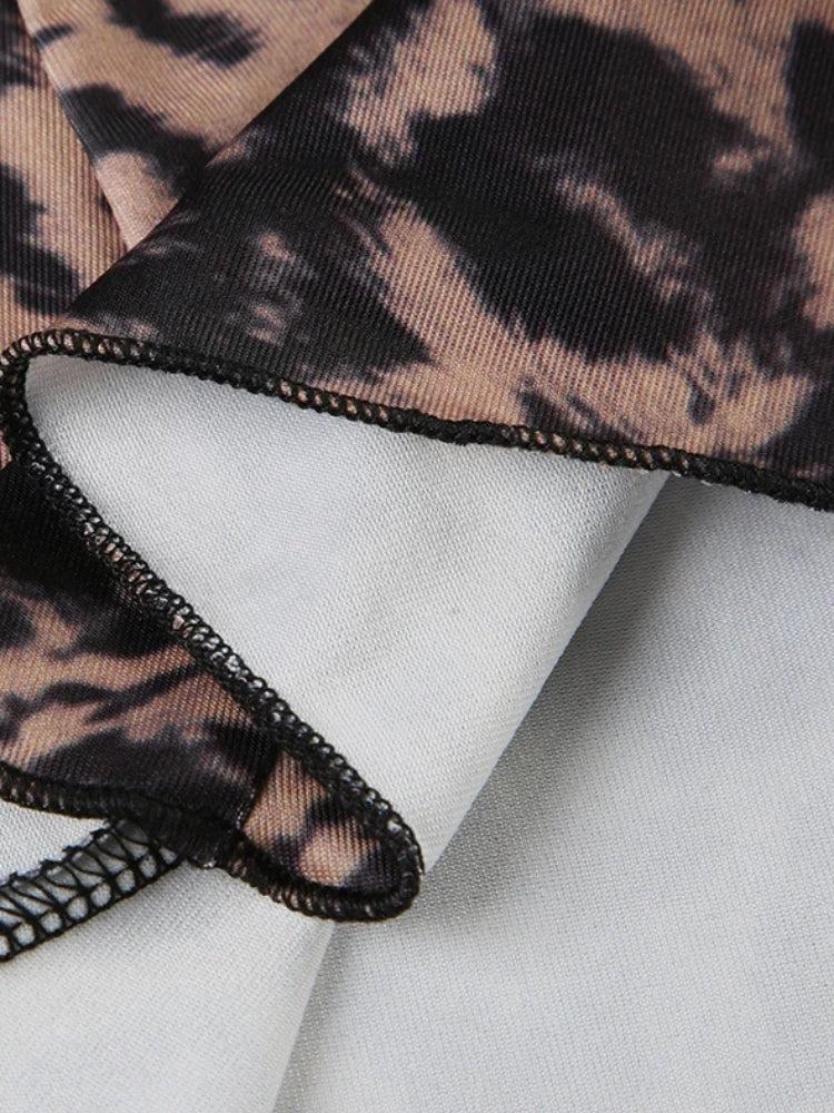 Abito corto con stampa leopardata e inserto in pizzo