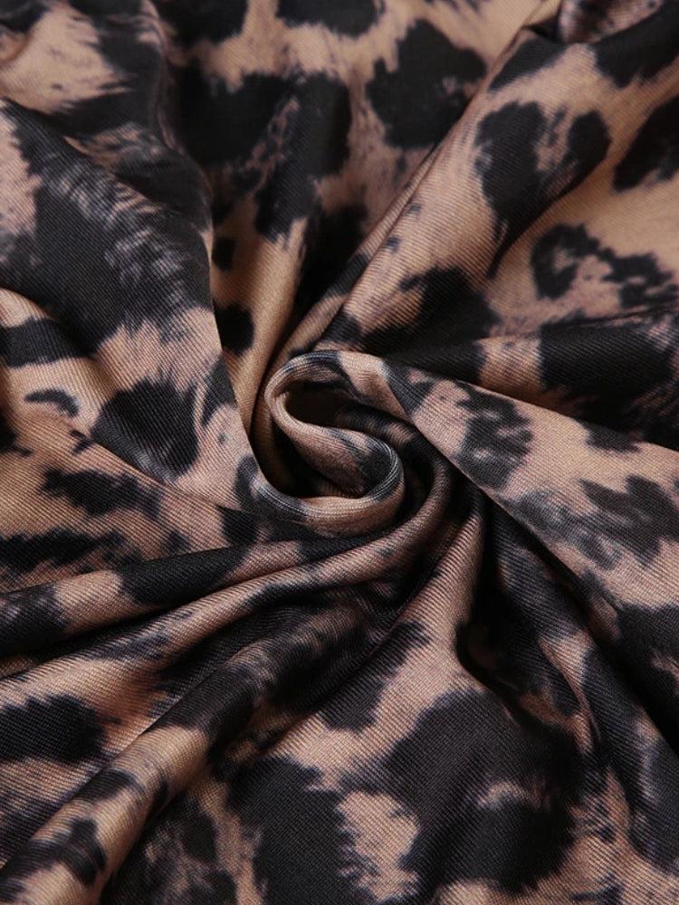 Abito corto con stampa leopardata e inserto in pizzo