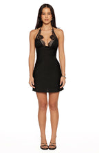 Abito corto nero in pizzo con scollo a V
