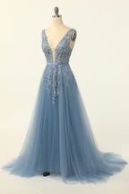 Abito da ballo in tulle blu con applicazioni in pizzo