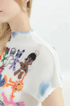 Top bianco con stampa a cartoon e maniche corte