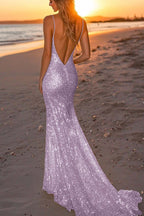 Abito da sera lungo argento con paillettes e scollo a V