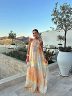 Abito lungo giallo con scollo halter in chiffon