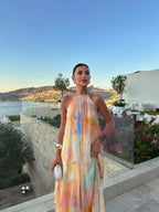 Abito lungo giallo con scollo halter in chiffon