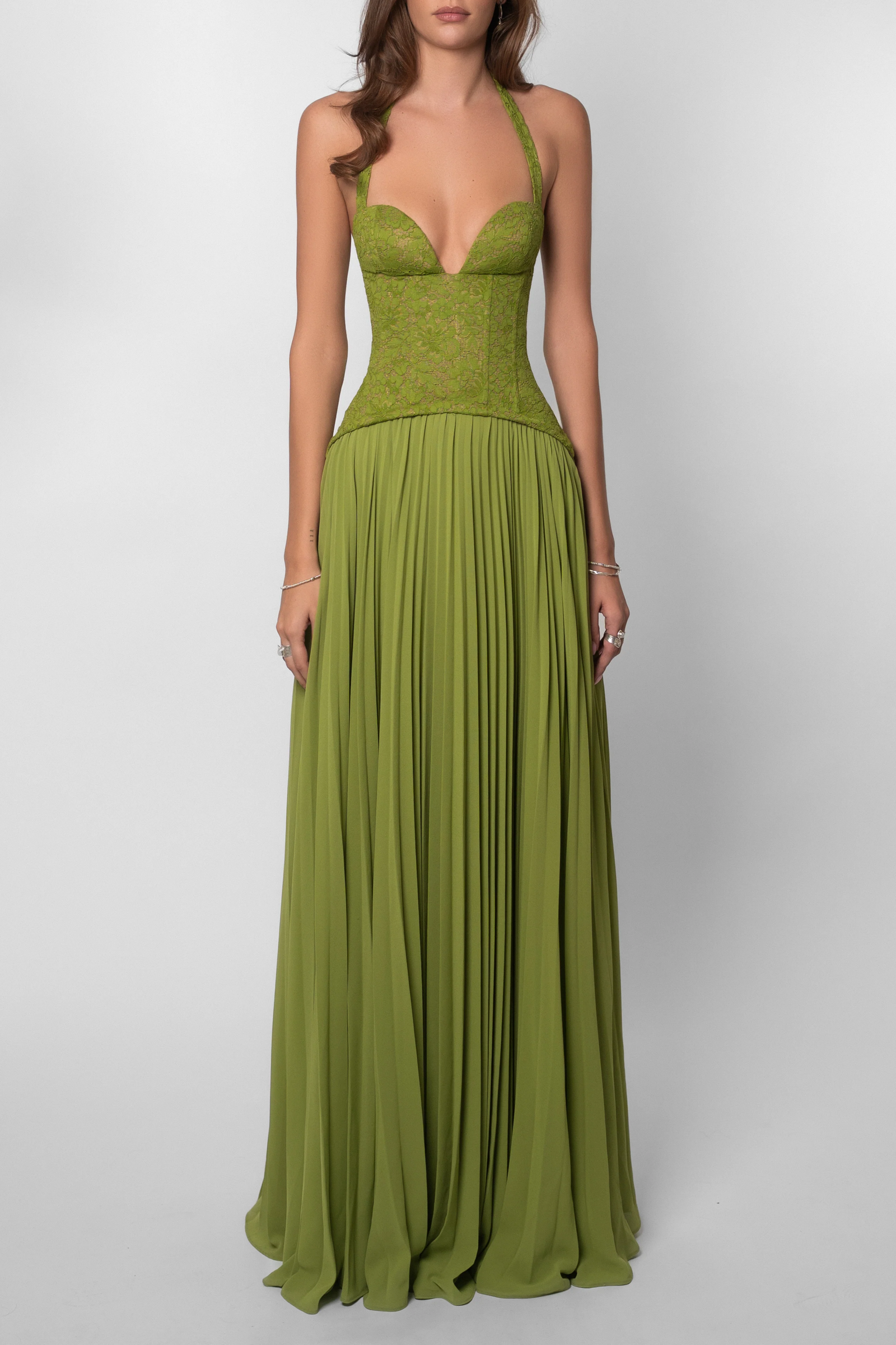 Abito lungo verde corsetto in pizzo con gonna plissé – Kenley