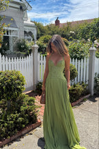 Abito lungo verde corsetto in pizzo con gonna plissé – Kenley