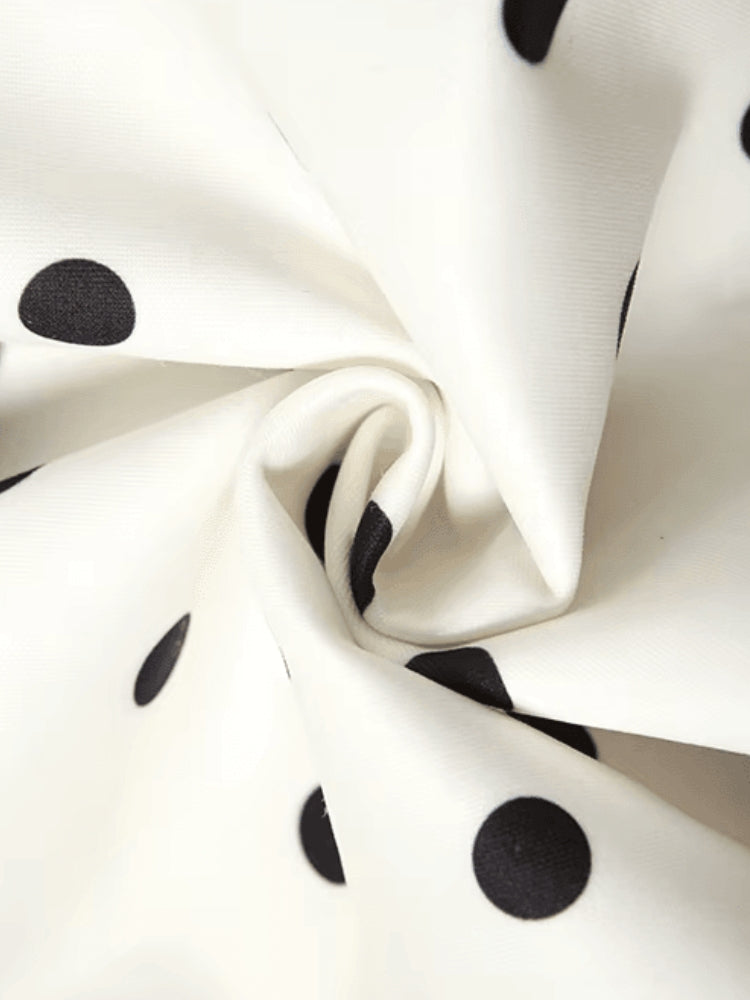 Abito corto strapless a pois neri