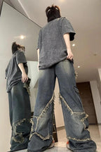 Jeans blu a vita alta con tasche cargo e stratificazioni