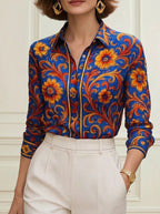 Camicia blu con stampa floreale e maniche lunghe